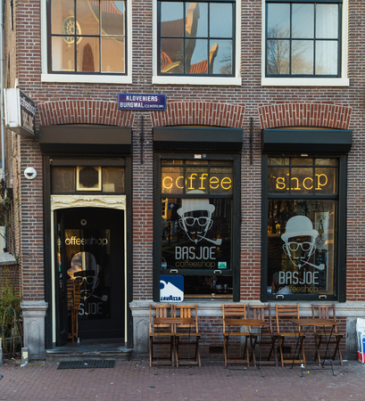 AMSTERDAM, NETHERLANDS - 17TH FEBRUARY 2016: The outside of a Coffee Shop in Amsterdam during the dayのeditorial素材