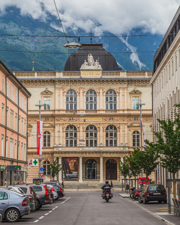INNSBRUCK, AUSTRIA - 18TH JUNE 2016: A view towards the Ferdinandeum in Innsbruck during the day. People can be seen.のeditorial素材