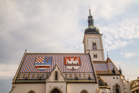 ZAGREB, CROATIA - 17TH AUGUST 2016: A closeup to the roof of St Marks Church in central Zagreb, Croatia during the day.のeditorial素材