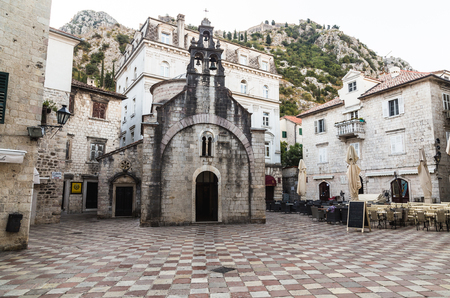 KOTOR, MONTENEGRO - 13TH AUGUST 2016: A view towards the Church of Saint Luke in the morning. Other buildings can be seen.のeditorial素材