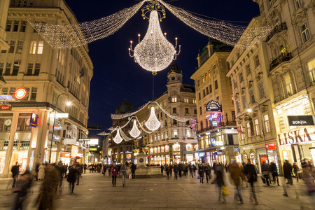 VIENNA, AUSTRIA - 2ND DECEMBER 2016: A view along Graben Street at night during the Christmas season. People, decorations and buildings can be seen.のeditorial素材