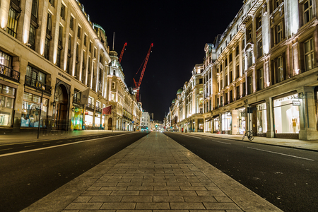 LONDON, UK - 8TH MARCH 2015:  Regent Street in central London at night showing the architecture and outside of buildings.のeditorial素材