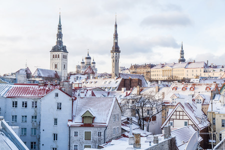 Part of the Tallinn Skyline in the winter showing St. Nicholas' Church, Alexander Nevsky Cathedral and part of Town Hall Towerの写真素材