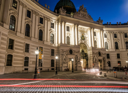 VIENNA, AUSTRIA - 23RD AUGUST 2016: The exterior of the Hofburg Palace in Vienna from Michaelerplatz at night.のeditorial素材