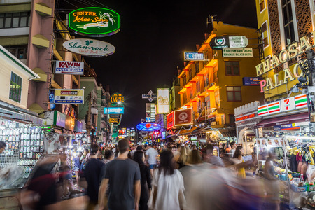 BANGKOK, THAILAND - 17TH MARCH 2017: A view along Khaosan Road in Bangkok at night.  The outside of shops and bars and large amounts of people can be seen.のeditorial素材