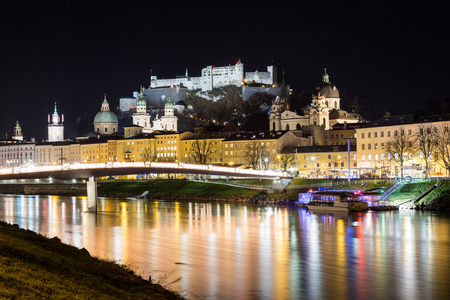 SALZBURG, AUSTRIA - 11TH DECEMBER 2015: Salzburg Old Town at night showing the outside of architecture and Hohensalzburgのeditorial素材