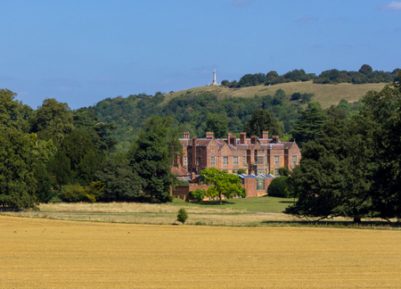 CHILTERN HILLS, UK - 31ST AUGUST 2013: A very large house located near the Chiltern Hills with the Combe Hill monument showing in the far distant,.のeditorial素材