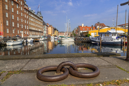 COPENHAGEN, DENMARK - 23RD MAY 2017: Boats docked along the Christianshavn canals in Copenhagen during the day. Reflections can be seen.のeditorial素材