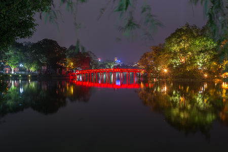 HANOI, VIETNAM,  20TH MARCH 2017: A view towards Ngoc Son Temple and Ho Hoan Kiem in Hanoi at night. Lights can be seen on the lake.のeditorial素材