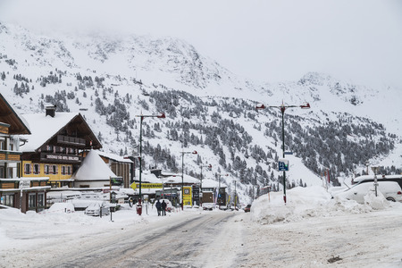 OBERTAUERN, AUSTRIA - 16TH DECEMBER 2017: A view of buildings and mountains in Obertauern in the winter season. People can be seen on the street.のeditorial素材