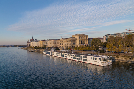 BUDAPEST, HUNGARY - 30TH OCTOBER 2015: Part of the Budapest skyline and waterfront showing part of the river Danube, a cruise ship and other architecture.のeditorial素材