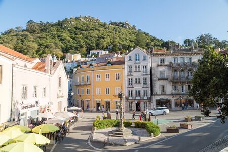 SINTRA, PORTUGAL - 11TH AUGUST 2019: Streets in Sintra Portugal during the day. The outside of shops, restaurants, buildings as well as people can be seen.のeditorial素材