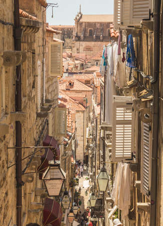 DUBROVNIK, CROATIA - 10TH AUGUST 2016: Narrow streets in Dubrovnik Old Town during the day. Showing the old style of architectureのeditorial素材