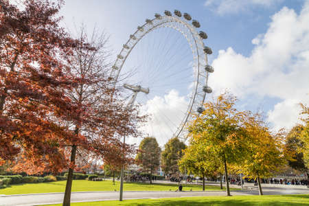 LONDON, UK - 10TH NOV 2018: The London Eye in central London. A popular tourist attraction that provides people with great views of the city. Lots of people can be seen outside.のeditorial素材