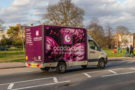 LONDON, UK - 3RD APRIL 2020: An Ocado delivery truck on a road in London during the day. Ocado is an online supermarket where people can buy groceries.のeditorial素材