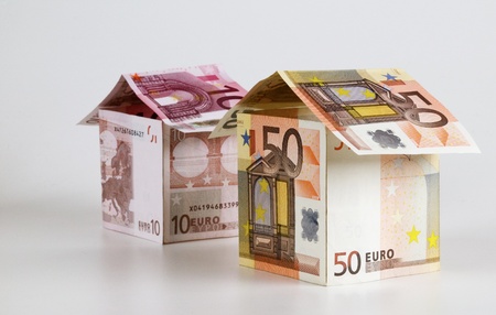 house built out of eurosの写真素材