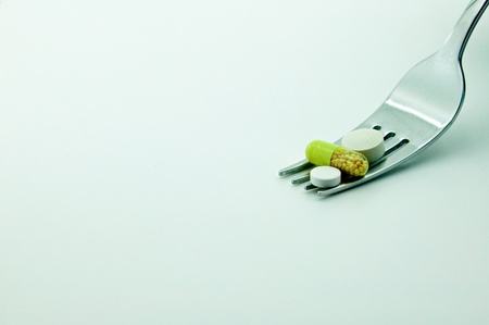 pills on a fork