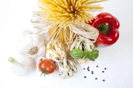 Mediterranean cooking with pasta and ingredients の写真素材