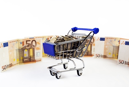shopping cart with moneyの写真素材
