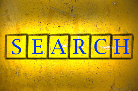 search writen on a wallの写真素材