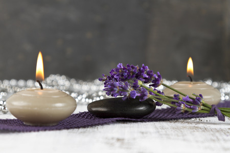 Wellness therapy with lavender and hot stonesの写真素材