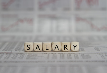 Salary word built with letter cubesの写真素材