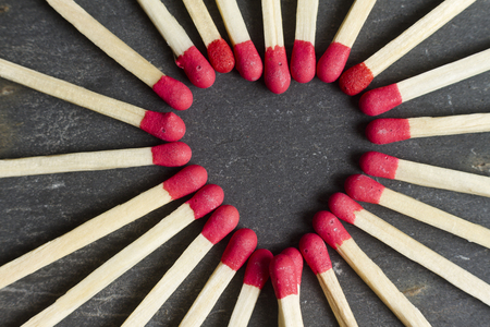 Heart made with matchesの写真素材