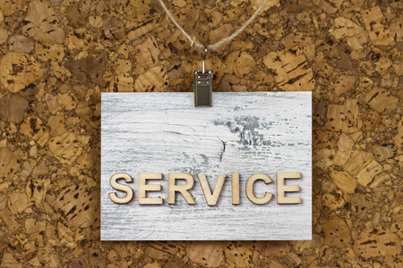 Note pad with Service word on a cork pinboardの写真素材