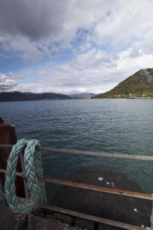 view at dolphin pile and fjord coastlineの写真素材
