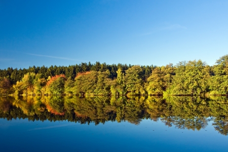 Pond in the autumn countrysideの写真素材