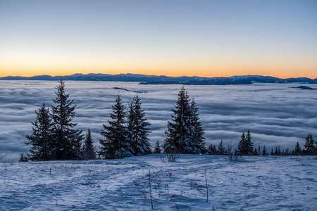 Amazing sunny morning in winter Little Fatra mountains above low clouds - Greater Fatra mountains on...