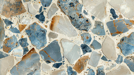 Decorative terrazzo floor surface with beige base and pastel blue decorative chips in a polished finishの素材