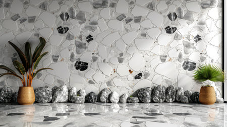 Minimal monochrome terrazzo texture featuring white base with scattered black and soft gray chips, seamless backdropの素材