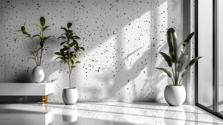Stylish grayscale terrazzo pattern with random decorative stone fragments over a minimal polished white backgroundの素材