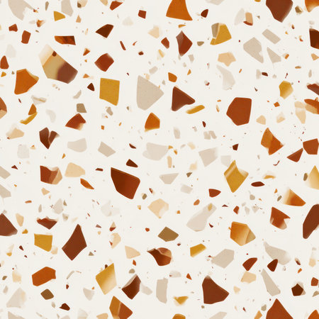 Abstract seamless terrazzo pattern with playful Light brown geometric fragments in vivid light brown scattered on a clean white backgroundの素材