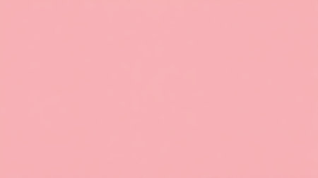 Solid pastel pink background, even flat color, no gradients, no patternsの素材