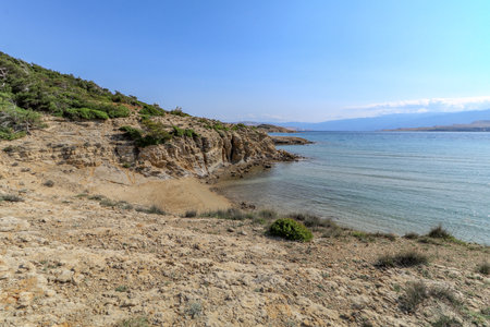 Pebble beach without people a place to relax Island Rab in Croatiaの写真素材