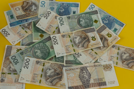 Money on the table, banknotes one hundred and two hundred zlotys in Poland