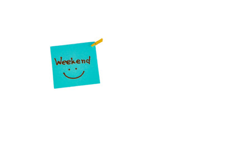Weekend fun end of work blue card with information reminding about the weekend smileの写真素材