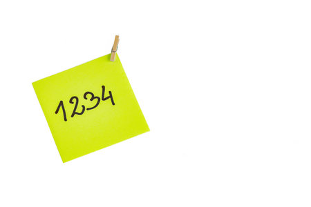 Computer password written on a yellow memo-stick computer passwords laptopの写真素材