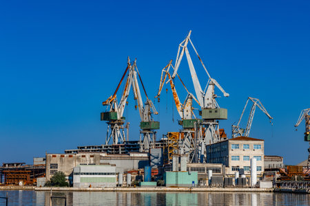 Cranes in the port of Pula in Croatia, construction and repair of ships in the port Croatiaの写真素材