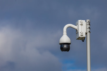 Camera hanging on the wall for video surveillance