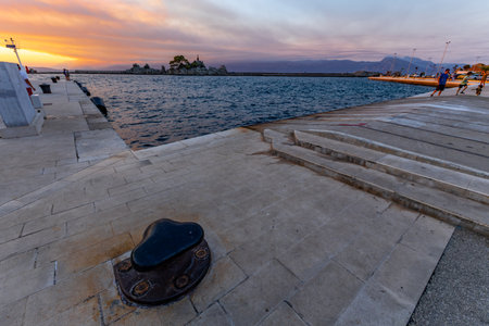 The sun sets below the horizon over the Adriatic Sea in Croatia