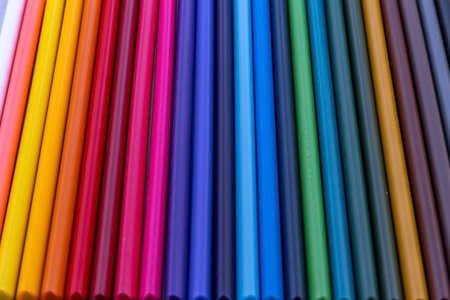 School supplies on the student's desk preparing for back to school colored pencils and markersの写真素材