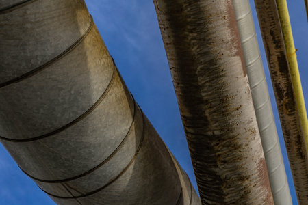 Old rusty pipeline, heating installation, water flow through old pipes