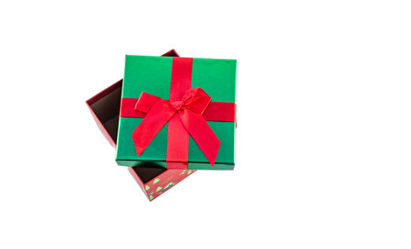 Red box in the hands of a man on a white background, a box for gifts, jewelry, for a loved one, with...