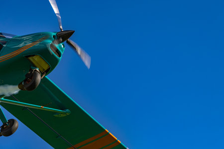 A display of low-flying planes over the airport, ultralight planes, and airplane acrobatics at the showの写真素材