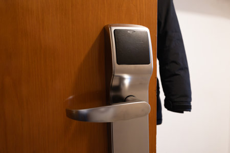 Opening the electronic lock on the apartment doorの写真素材