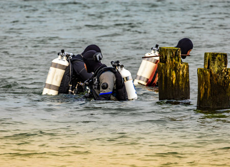 Scuba divers conducting operations in the Baltic Seaの写真素材