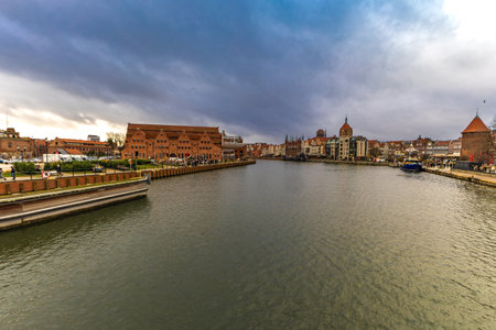 The center of the old town of GdaÅ„sk, a walk along the Motlawa River, historic tenement houses,...